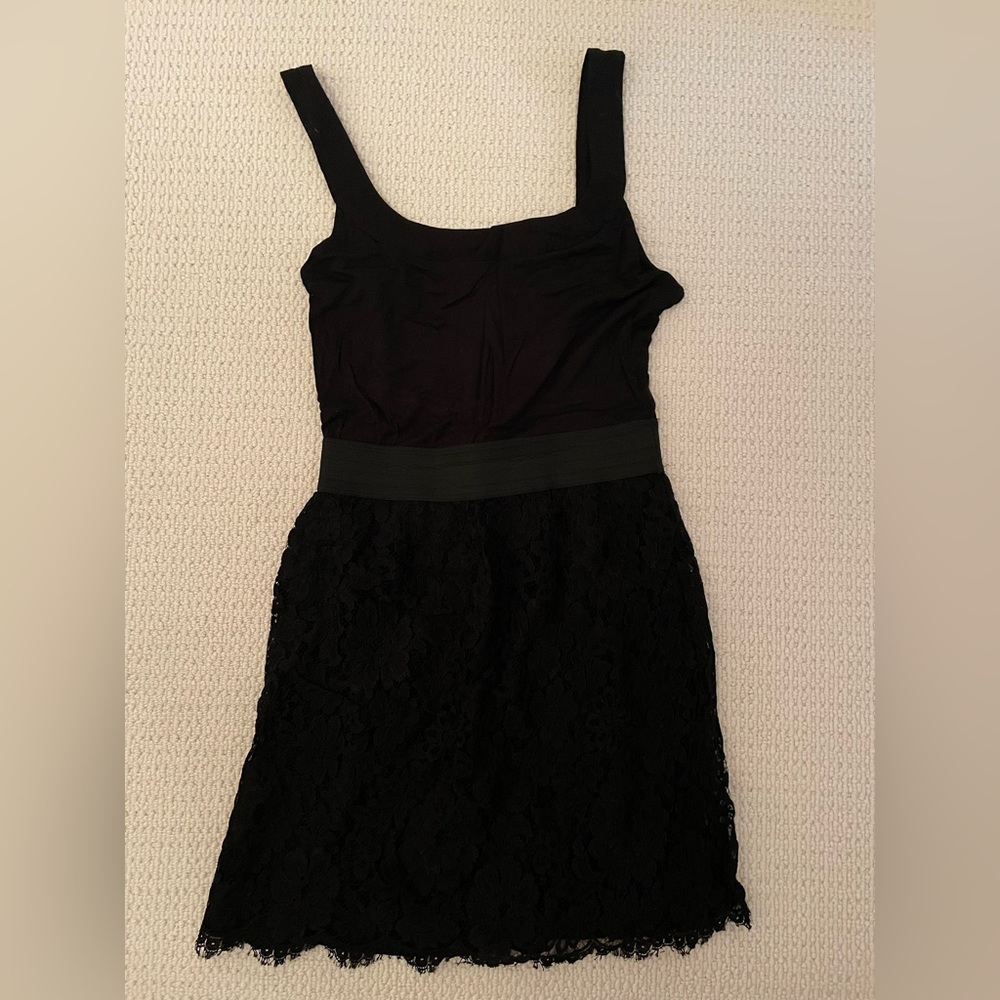 Eight Sixty black lace mini dress size medium with stretch